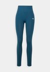DEFINE SEAMLESS SCRUNCH - Leggings - teal
