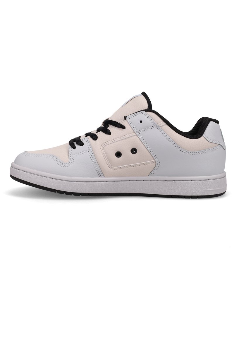 White and light grey sneaker with black laces, synthetic upper, solid rubber sole, and side accents. Features round toe and padded collar.
