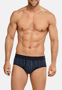 Caleçons pour hommes bleu marine avec un motif rayé, une taille élastique et une coupe ajustée. Fabriqués en tissu doux avec une texture lisse.
