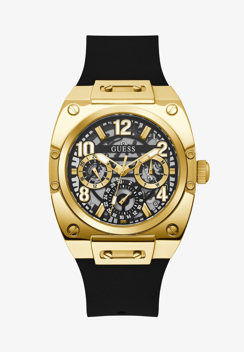Goldfarbene Uhr mit einem schwarzen Gummiband. Verfügt über ein schwarzes, strukturiertes Zifferblatt mit goldenen Akzenten und mehreren Unterzifferblättern. Auffällige Stundenmarkierungen.
