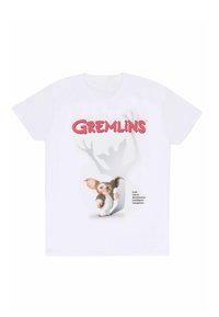 Bílé bavlněné tričko s grafikou malého tvora s velkýma ušima a hravým výrazem, doplněné textem „Gremlins“ a popisy.
