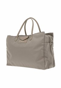 Borsa a spalla in nylon beige con due manici superiori, forma strutturata e tasca frontale con patta triangolare. Superficie textured con accenti metallici.