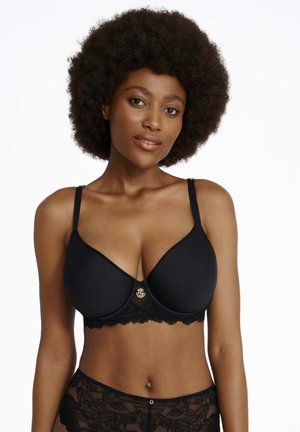 Czarny biustonosz wyściełany, z koronkowym wykończeniem, z zapięciem z przodu w kolorze złotym. Gładka faktura i zaokrąglony kształt. Ramiączka są regulowane.