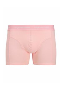 Rosa Boxershorts mit weichem Material, die eine enganliegende Passform, eine gebogene Fronttasche und einen passenden elastischen Bund mit der Aufschrift "Originals Studio" haben.