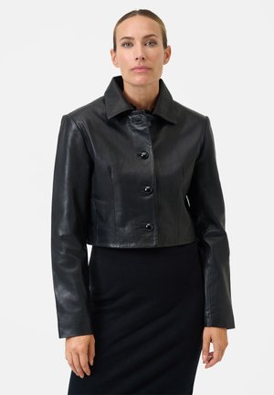 Black leather cropped jacket with a structured collar, featuring four front buttons and long sleeves, smooth texture, and tailored fit.