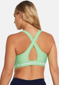 Under Armour CROSSBACK MID  - Športni modrček s srednjo podporo - matrix  green matrix green  white