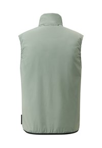Hellgrünes ärmelloses Oberteil mit hohem Kragen, aus glattem Stoff gefertigt, mit gerafften Seitendetails und einem kontrastierenden schwarzen Saum.