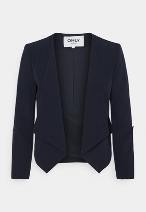 Blazer entallado azul marino con abertura frontal, mangas largas y dobladillo asimétrico puntiagudo, mostrado sobre fondo blanco.