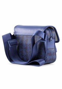Borsa a tracolla blu con cinturino regolabile, tessuto a motivo geometrico, patta in pelle e tasca laterale con zip.