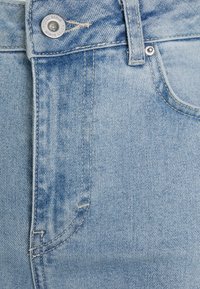 PIECES Tall PCHOLLY  - Calças de ganga de corte relaxado - light blue denim