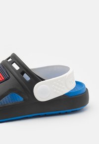 Tommy Hilfiger SOLEIL UNISEX - Mules - black/white