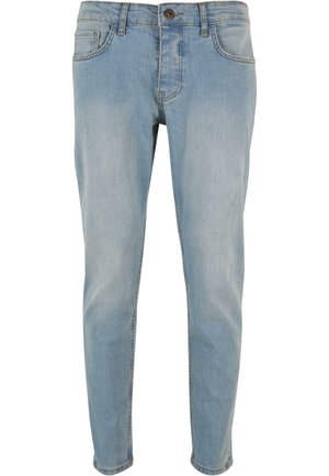 Lysblå denimjeans med slim fit, der har fem lommer, subtilt slid, en knaplukning og stikninger ved sømmene.