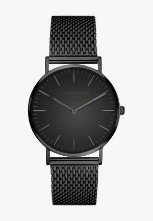 Runde schwarze Uhr mit matter Oberfläche, minimalistisches Design, dünne Stundenmarker und ein schwarzes Metallnetzarmband. Verfügt über eine Krone an der Seite.