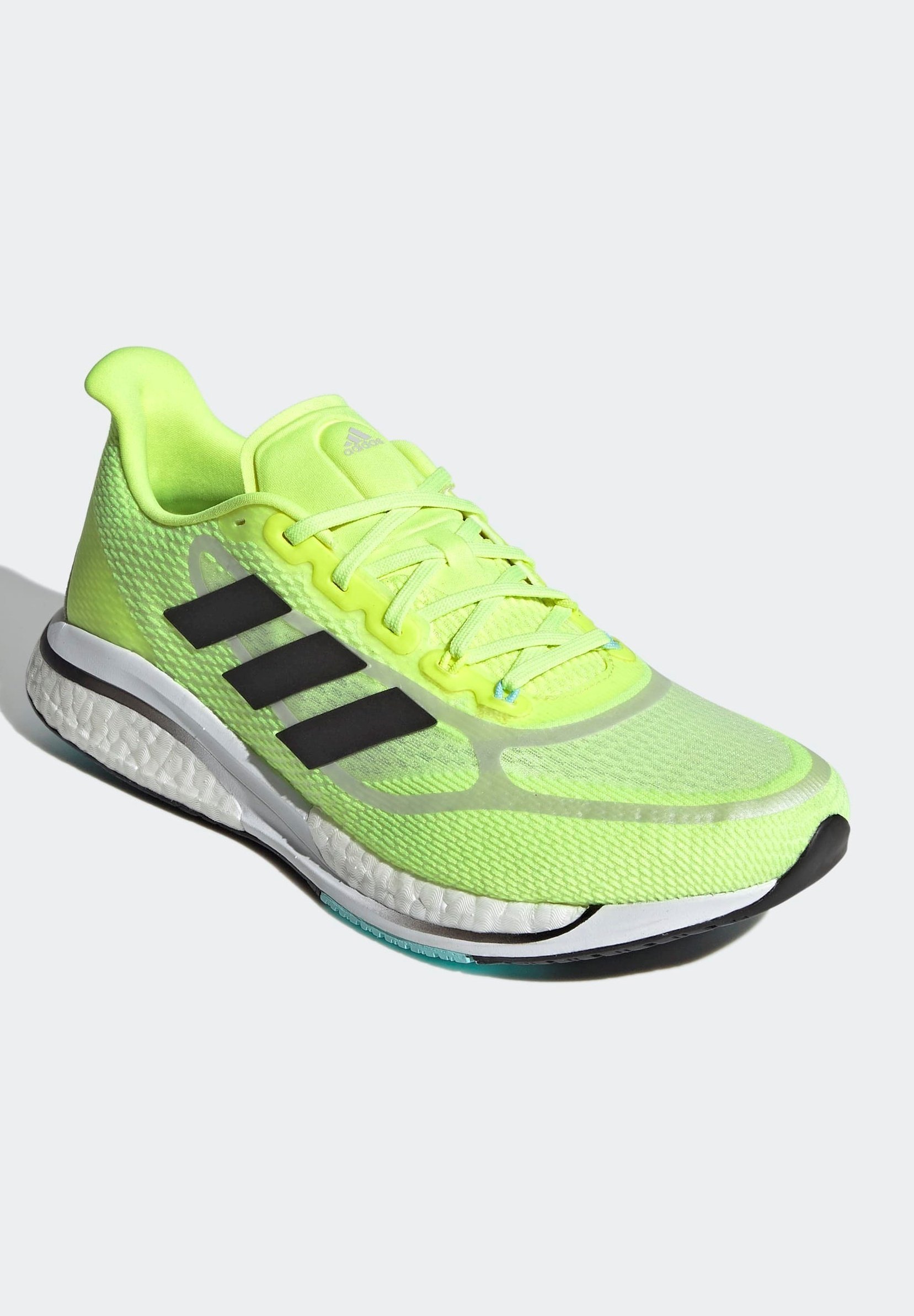 yellow adidas running trainers