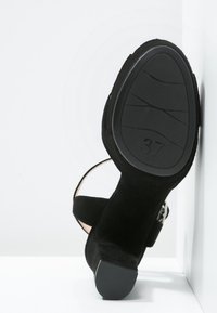 Unisa Sandaletter - black