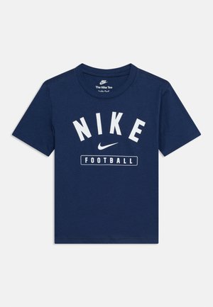 Navy blue short-sleeve Nike T-shirt with white "NIKE" text, swoosh logo, and "FOOTBALL" in a white outlined box on the front.