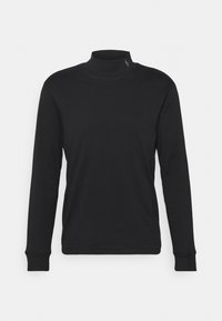 Svart polokrage av mjukt, stretchigt material med långa ärmar, med en slimmad passform och en liten logodetalj på vänster axel.