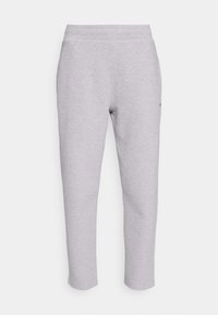 Light gray, ribbed sweatpants with an elastic waistband, tapered legs, and a small logo accent on the side. Soft, comfortable material.