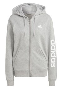 Šedá mikina na zip vyrobená z bavlněné směsi. Obsahuje kapuci, dvě předn í kapsy a bílé logo "adidas" na levém prsu a rukávu.