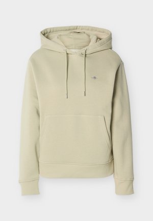 Sweat à capuche beige clair avec poche avant, cordons, poignets côtelés et petit logo brodé sur la poitrine.