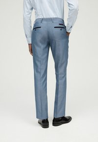 Next SLIM FIT TRIMMED - Uzvalka bikses - light blue