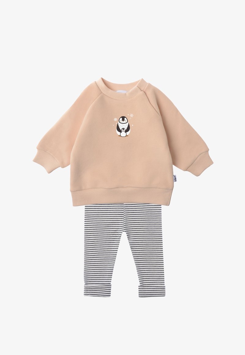 Light pink fleece sweatshirt with a penguin graphic, paired with gray and white striped leggings. Both are soft and casual.