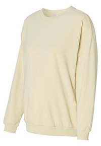 Lichtgele sweatshirt van zacht materiaal. Beschikt over een ronde halslijn, verlaagde schouders en ribgebreide manchetten en zoom.