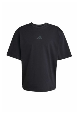 Černé bavlněné tričko s krátkým rukávem, volný střih, kulatý výstřih a decentní tmavě šedé logo Adidas na hrudi.