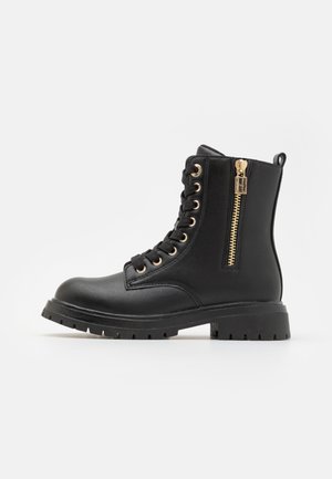ASHLYN UNISEX - Botines con cordones - black
