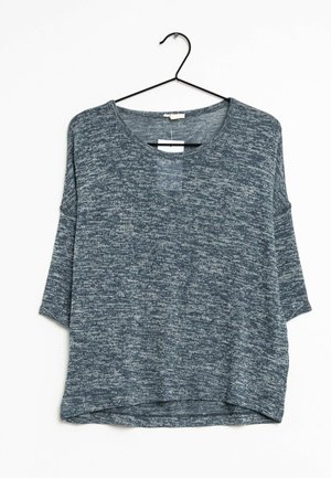 Top a maniche corte appeso a un gancio nero, realizzato in tessuto blu navy testurizzato con un motivo mélange, dotato di un ampio scollo e di una vestibilità comoda.