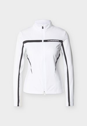 Veste blanche à fermeture éclair avec des rayures horizontales et verticales noires, arborant le texte "J.LINDEBERG" sur la poitrine.