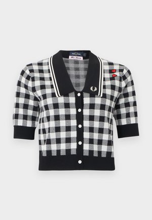 Black and white checkered short-sleeve cardigan with black collar, white buttons, laurel logo on collar, and two red heart patches on shoulder.