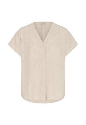 Blouse beige à manches courtes avec col en V, coupe ample et tissu subtilement texturé, adaptée pour un style décontracté ou professionnel décontracté.