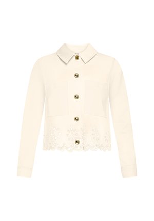 Cream long-sleeve jacket with collar, gold buttons down front, two chest pockets, and floral lace cutout detail at hem.