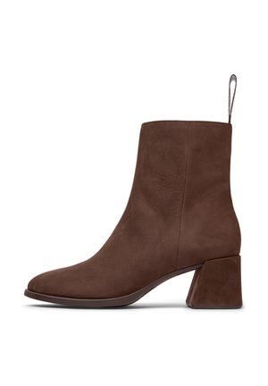 Brown leather ankle boot, with a smooth texture, tapered toe, and a square block heel. Features a loop at the back for easy wear.