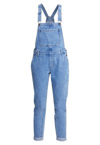 Salopette en denim bleu clair, dotée de bretelles ajustables, d'une poche frontale et de jambes effilées avec des revers. Fabriquée en tissu denim doux.