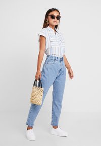 Dr.Denim Petite NORA  - Calças de ganga de corte relaxado - light retro