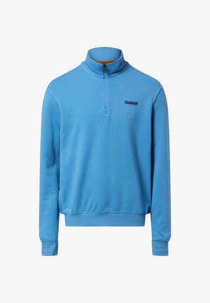 Lichtblauwe pullover met halve ritskraag, geribbelde manchetten en tailleband. Voorzien van een klein zwart logo op de borst.