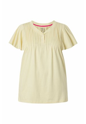 Jasnożółta bluzka z krótkim rękawem, plisowanym przodem, okrągłym dekoltem z guzikami oraz subtelną kropkowaną fakturą.