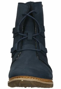 Navy blue leather ankle boot with lace-up design, featuring side straps, a textured exterior, and a light brown rubber sole.