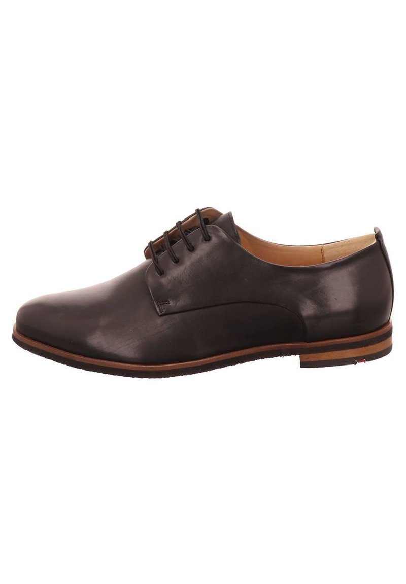 Men's black leather shoe with a sleek design, round toe, thin laces, and a subtle brown accent on the sole. Smooth texture, minimal stitching.