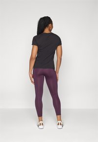 Puma FAVORITE FOREVER HIGH WAIST 7/8 - Leggings - midnight plum
