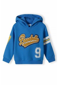 Blå huvtröja med en broderad grafik av "Baseball", gula accenter och vita randiga detaljer på ärmarna. Nummer 9 på framsidan.