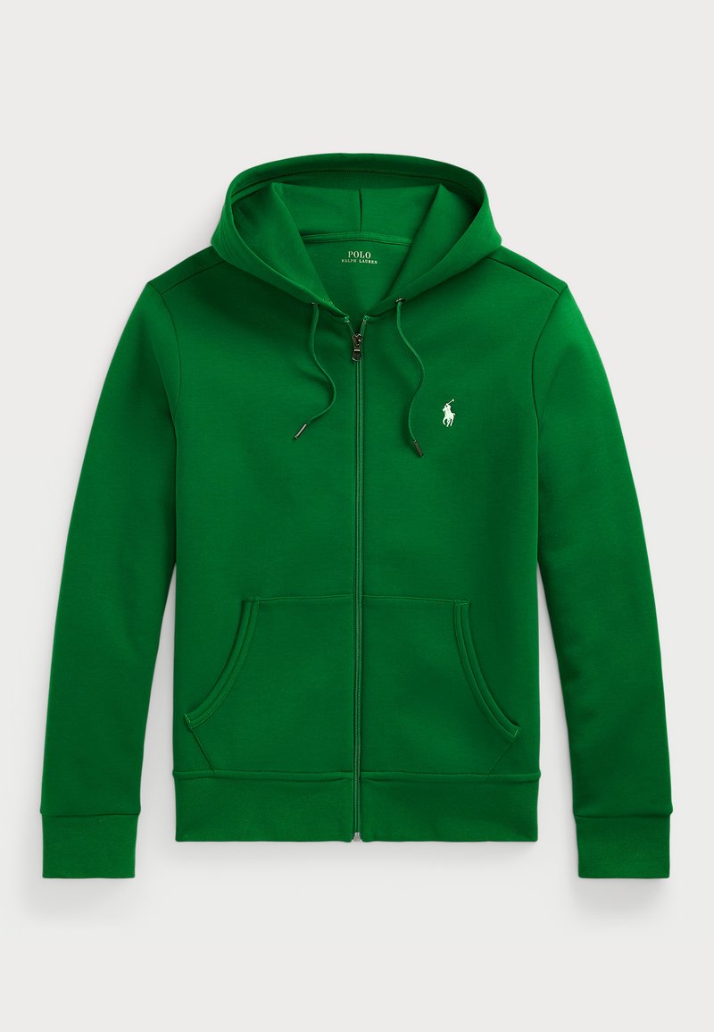 Grønn zip-up hettejakke med snorhette, lommer foran, ribbestrikkede mansjetter og en liten hvit polo-logo på brystet. Mykt, strukturert stoff.