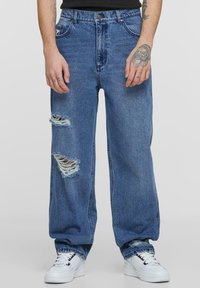 Karl Kani - SMALL SIGNATURE BAGGY FIVE POCKET HEAVY DISTRESSED - Jeans baggy - blue indigo Immagine in miniatura 1