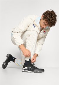 Puma KIDSUPER RBS TRAVEL PANT - Športne kratke hlače - elektro blue/frosted ivory