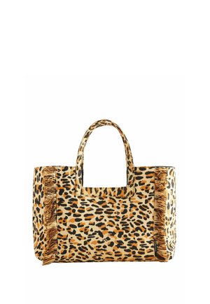 Torba na zakupy z wzorem w cętki i pionowymi frędzlami po obu stronach, wyposażona w dwie krótkie rączki.