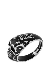 Skull-shaped ring made of textured black and silver stainless steel, featuring a distressed finish and engraved "DIESEL" logo.