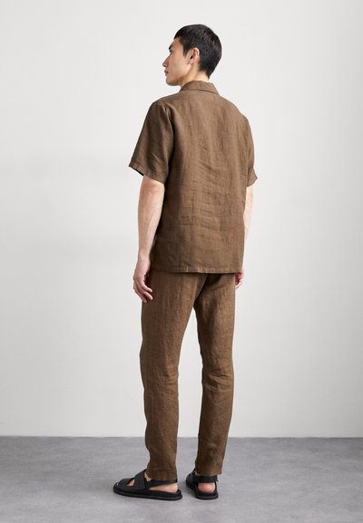 NN.07 THEO - Püksid - brown