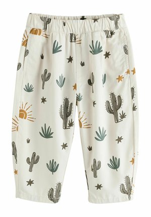 Kremfarvede babybukser med elastisk talje, dekoreret med grønne kaktusser, orange soler og brune stjerne mønstre.